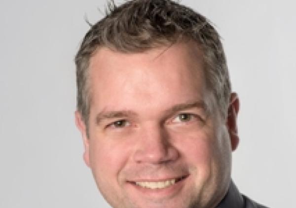 De heer J.J. Surie