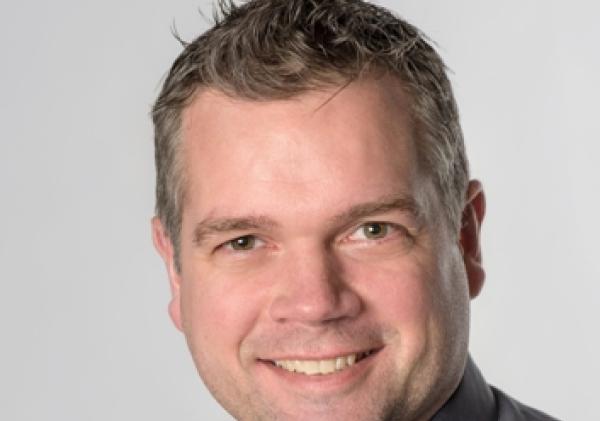 Gemeenteraadslid VVD J.J. Surie